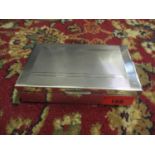 A 1960's silver cigarette box hallmarked Mappin & Webb, wooden lined, total weight 325.5g