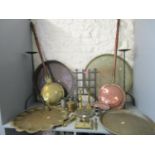A selection of metalware to include Georgian warming pans, wrought iron pricket candleholders,