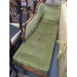 A Victorian walnut green button back upholstered chaise longue on turned feet 35" H x 67" W