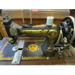 Naples composition figures, a 1960s oak barometer, a manual Frister & Rossman sewing machine, an oil