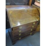 A 19th century and later mahogany bureau having a fall flap above four graduated drawers 38 1/2" H x