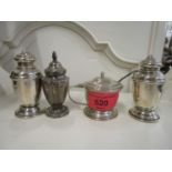 A small selection of silver condiments to include a mustard pot
