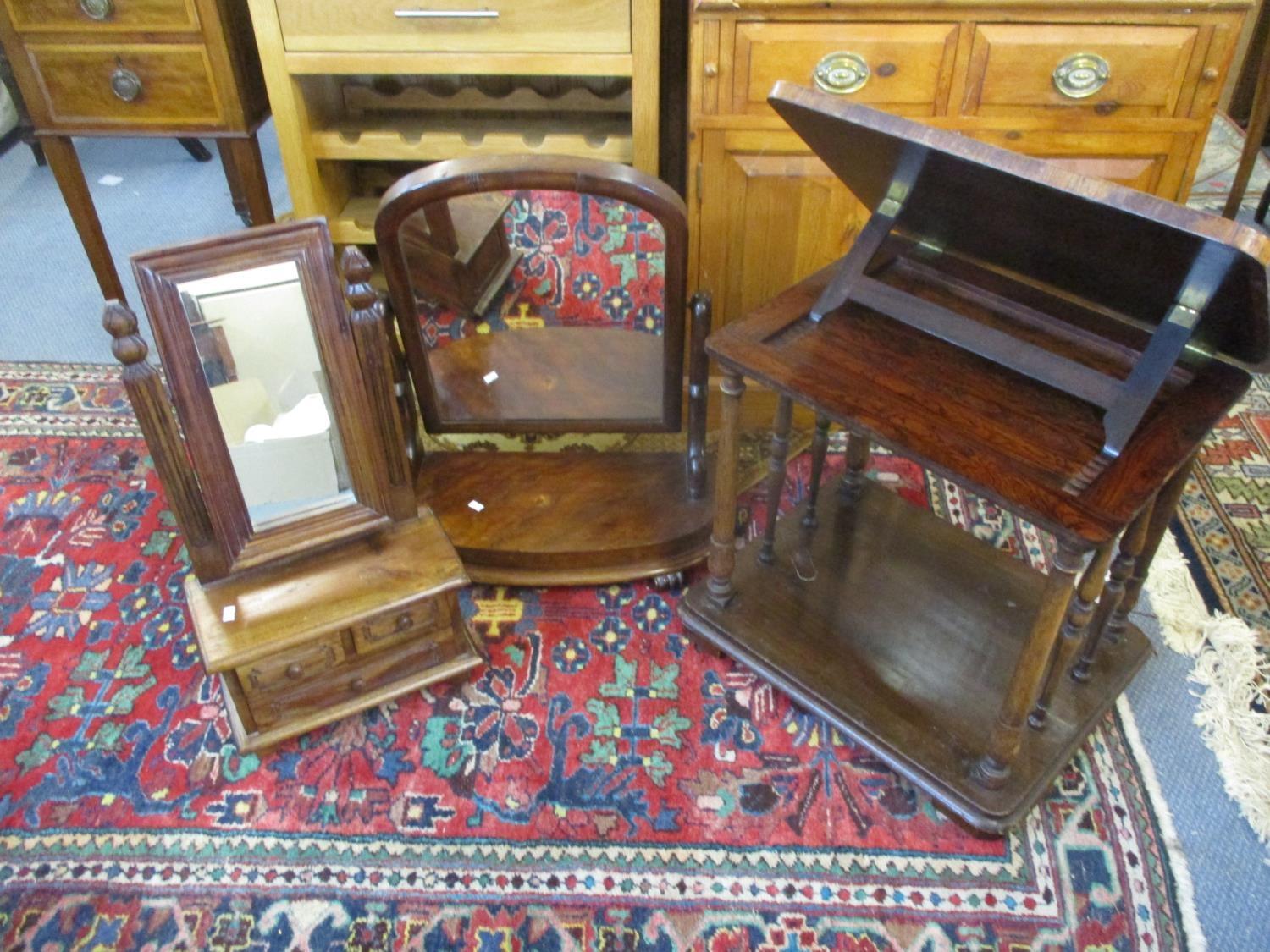 A 19th century and later rosewood and mahogany reading table, a Victorian mahogany swing mirror