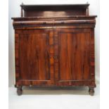 An early 19th century rosewood chiffonier, the upstand with a shelf, over two cushioned drawers