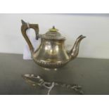 A Victorian silver teapot with fluted decoration, London 1896 and a small silver spoon with entwined