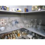 A lot of china and glassware to include a ships decanter and a 19th century Delft ware vase