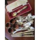 Mixed silver and white metal items to include four napkin rings, silver handled knives and other