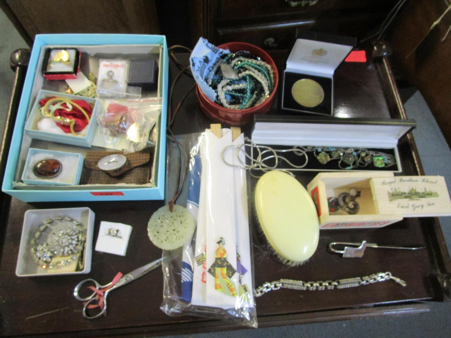 A mixed lot of costume jewellery to include a white metal 19th century bracelet and a pair of 9ct