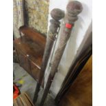 A pair of Victorian mahogany curtain poles 79 1/4" long