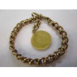 A 9ct gold chain with a full sovereign 27g total