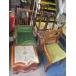 A velvet upholstered chair with wooden back-rail and sitting on ball and claw carved feet. A