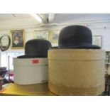 A Lombard Walter Davis black bowler hat, together with a Tress & Co. black bowler hat and two