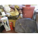 A hamper basket, a Hi design brown leather holdall, a suit carrier, a travelling jewellery box,