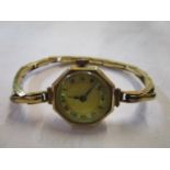 An Art Deco 9ct gold Swiss watch
