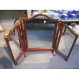 A three fold mahogany dressing table mirror