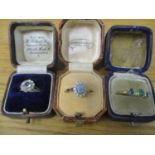 Three gold rings, two stamped 9ct, one set with an opal dublet and paste stones, another with all