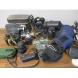 Photographic equipment to include a Minolta Dynax 300i, an Olympus OM-System auto zoom and other