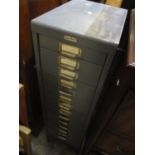 A vintage fifteen drawer filing cabinet, 39 1/2"h x 11"w