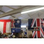 Four large fabric flags to include the Union Jack and England