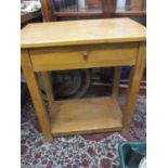 A reconstituted pine butchers block style table with a drawer, 28" h x 26" w x 16"d
