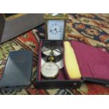 A five window carriage clock with key and enamelled dial, a vintage Post Office savings tin and a