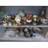 A collection of pots and vases depicting worldwide styles, mostly signed Maria and other items to