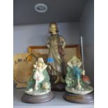 Two A.D.L. figures by Vittorio Tessaro, Italy, signed A/F, together with a painted plaster figure of