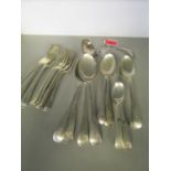 A part set of Victorian silver cutlery, each with an engraved crest comprising one ladle, three