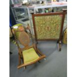 A Victorian inlaid mahogany folding chair with upholstered seat, oval caned panel to back, flanked