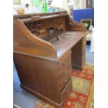 An early 20th century mahogany desk with 2 pedestals of four drawers, having a leather scriber A/F