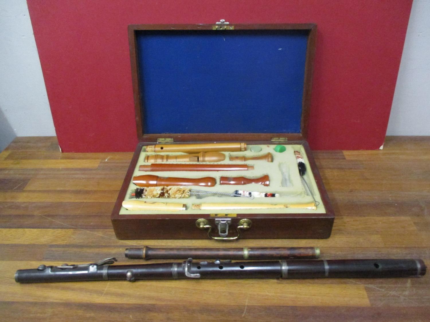 Three recorders and the component parts of a late 19th century/early 20th century flute and