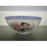 A Chinese egg shell porcelain bowl decorated to the exterior with a lattice of circlets in the