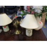 A quantity of table lamps to include a 1930's brass student lamp and a ceramic vase of faux flowers