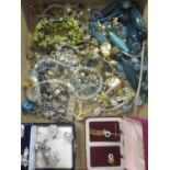 A mixed lot of costume jewellery to include a silver ingot on chain, marcasite pieces, ladies