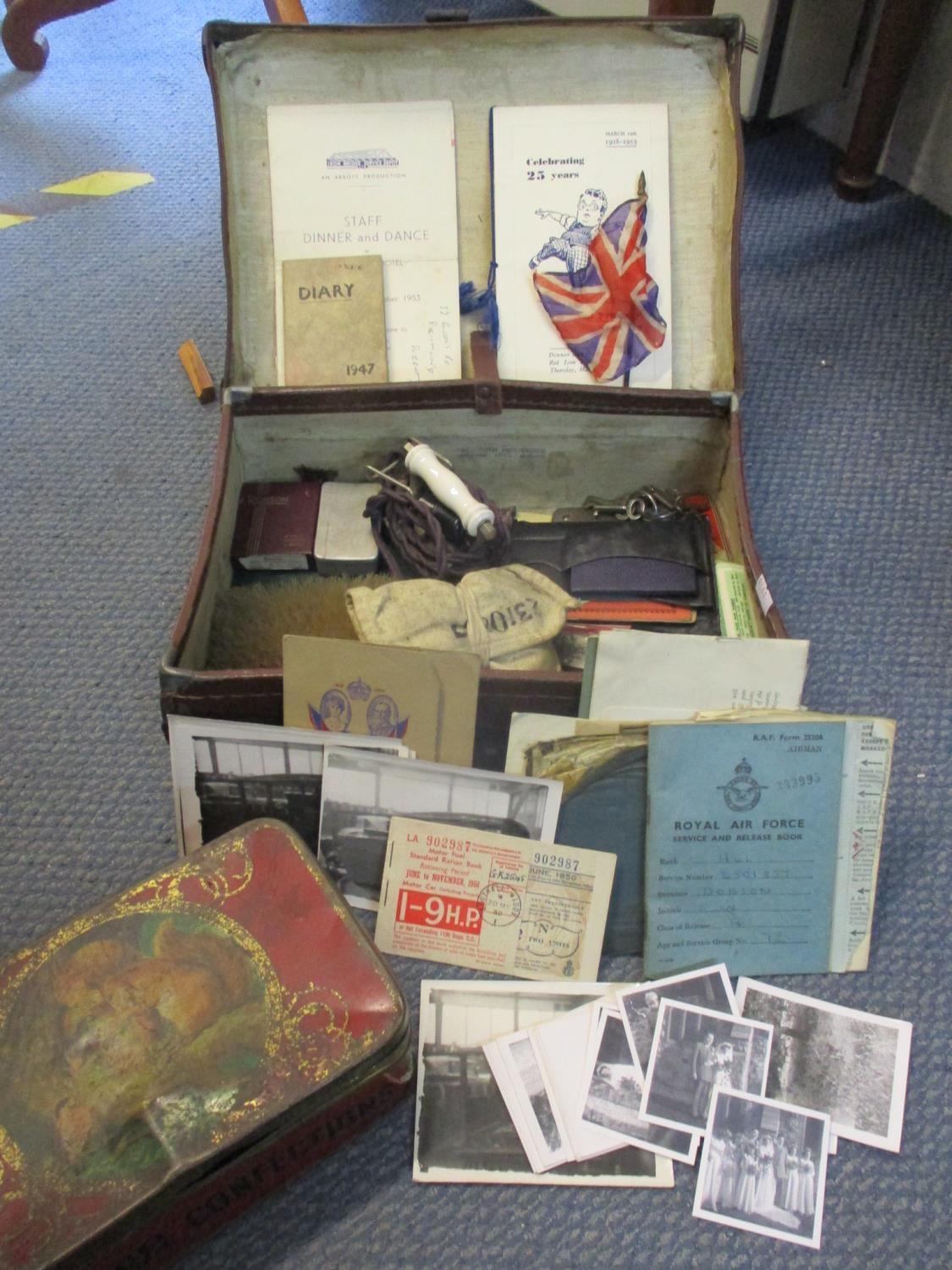 Items belonging to WW2 RAF Airman Eric Dobson all housed within a small leather suitcase, the