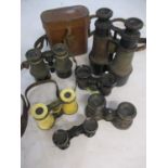 A quantity of binoculars to include a pair of early 20th century ivory opera binoculars