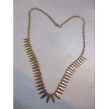 A 9ct gold tri-coloured Cleopatra style necklace 6.4g