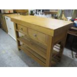 A modern oak kitchen island with two short drawers and two slatted shelves 36 1/4" x 47 1/2" x 23