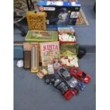 A mixed lot of toys and games to include a programmable robot, boxed, board games, diecast toy