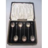 A set of six silver coffee bean terminal spoons