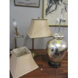 Two adjustable brushed brass table lamps with shades together with a contemporary bulbous and chrome