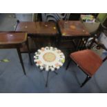 A reproduction mahogany revolving bookcase, together with a small mahogany side table, a small