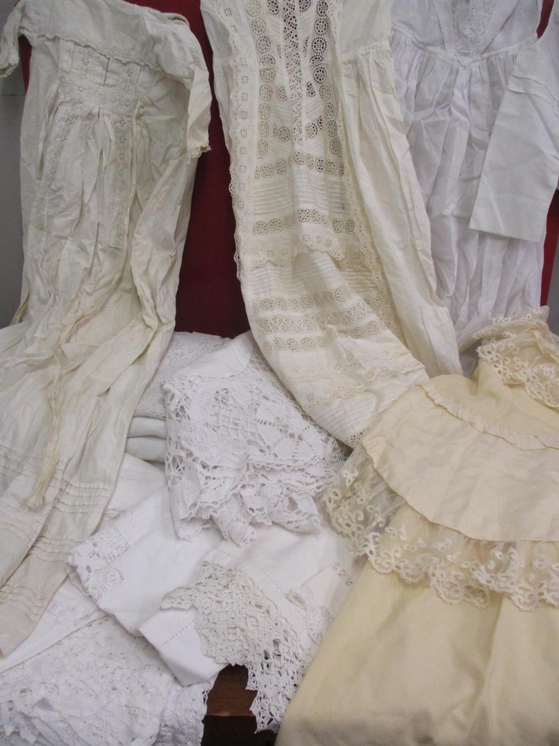 Table linen, christening gowns, early 20th century boy's cotton shirt and a cream silk and lace