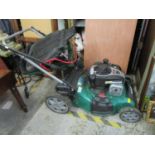 A Qualcast petrol lawnmower