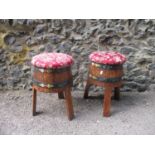 A pair of mid 20th century barge-wear oak stools with painted strap-work and burgundy floral