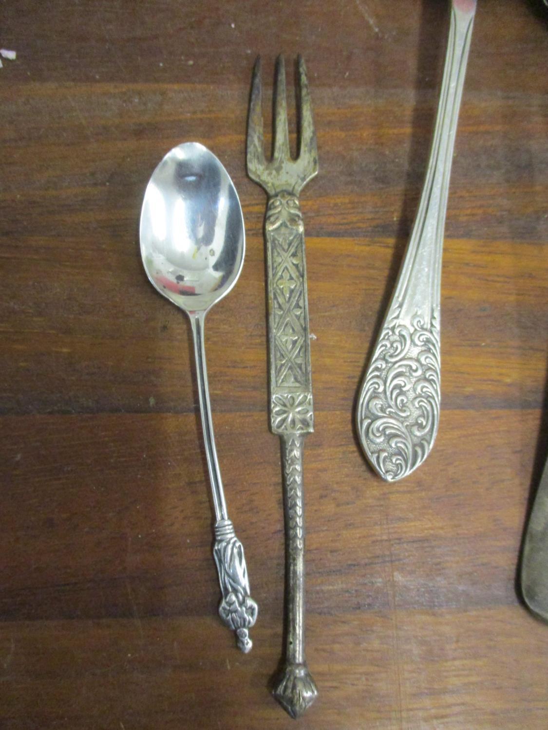 Metalware to include copper jelly moulds, an Arts & Crafts kettle, cutlery and flatware, silver - Image 3 of 6