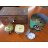 A silver pocket watch and other items to include two mid 20th century bedside clocks