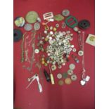 A quantity of mixed early to mid 20th century shirt studs, chains, buckles and other items to