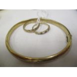 Two 9ct gold rings together with a 9ct gold bangle, 12.95 grams