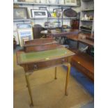 A ladies walnut writing desk with green leather scriber